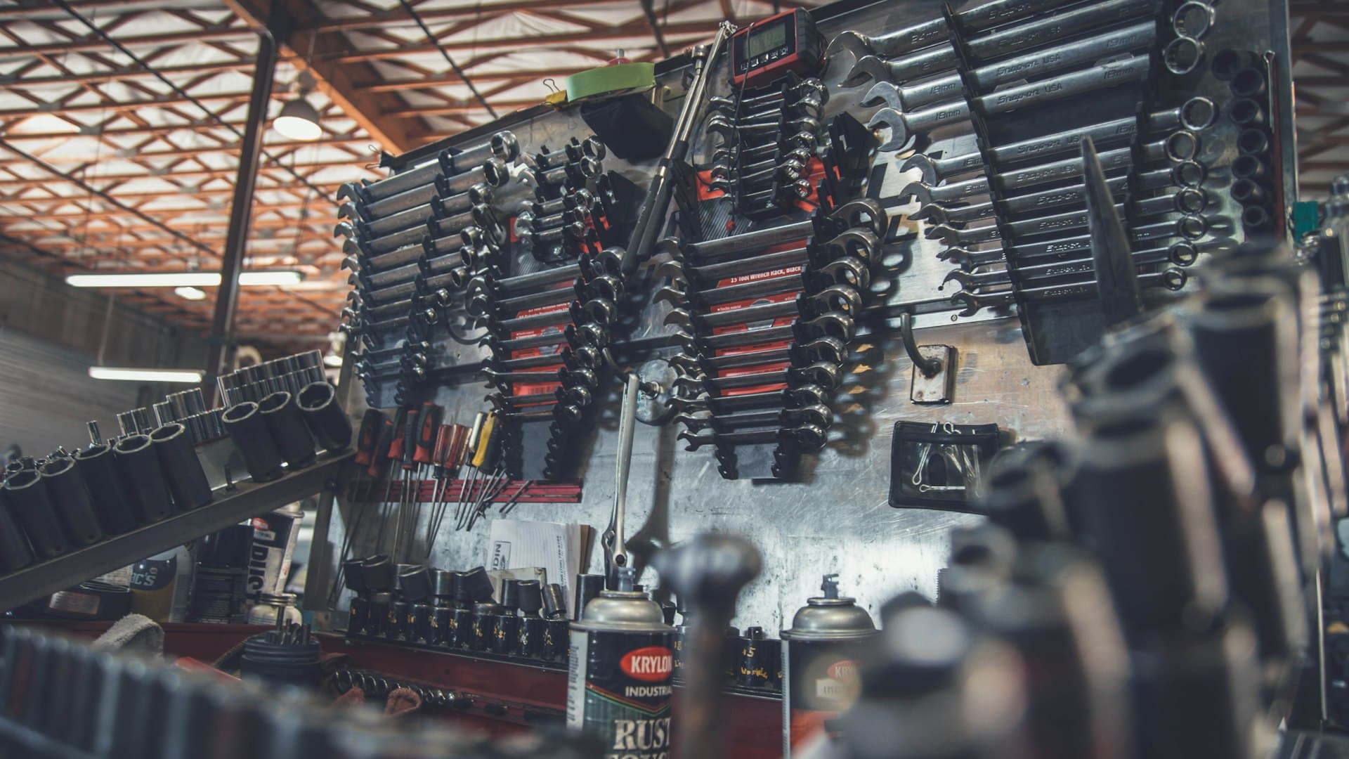 Mechanic working on a vehicle engine
